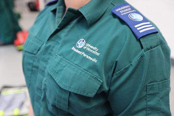 Close-up of student in University of Worcester paramedic uniform
