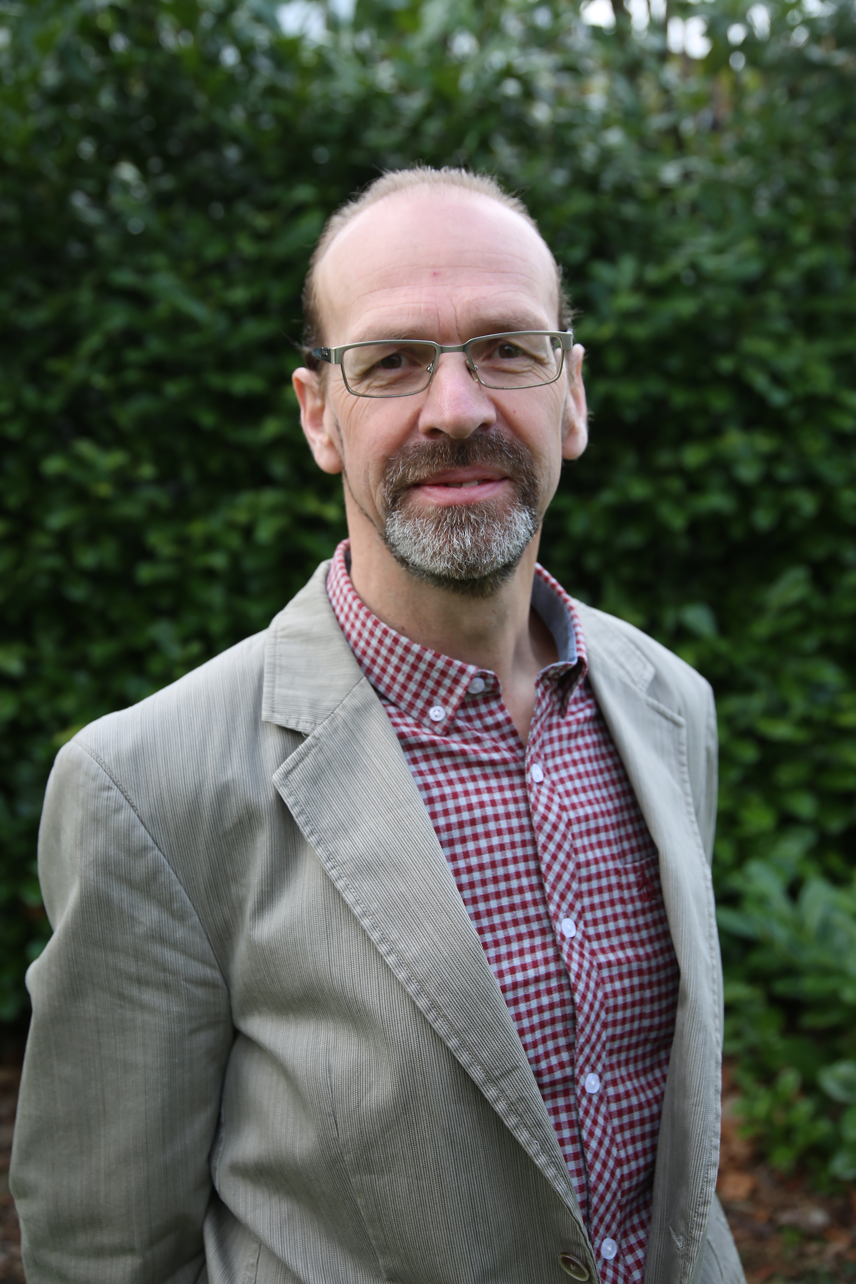 University of Worcester logo on a light blue background