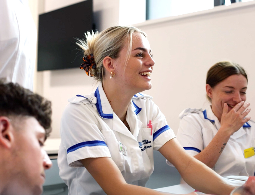 Three nursing students during a skills demonstration