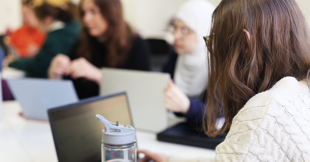 A student working on a laptop