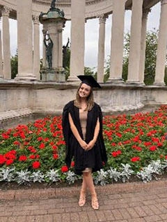 University of Worcester logo on a light blue background