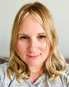 University of Worcester logo on a light blue background