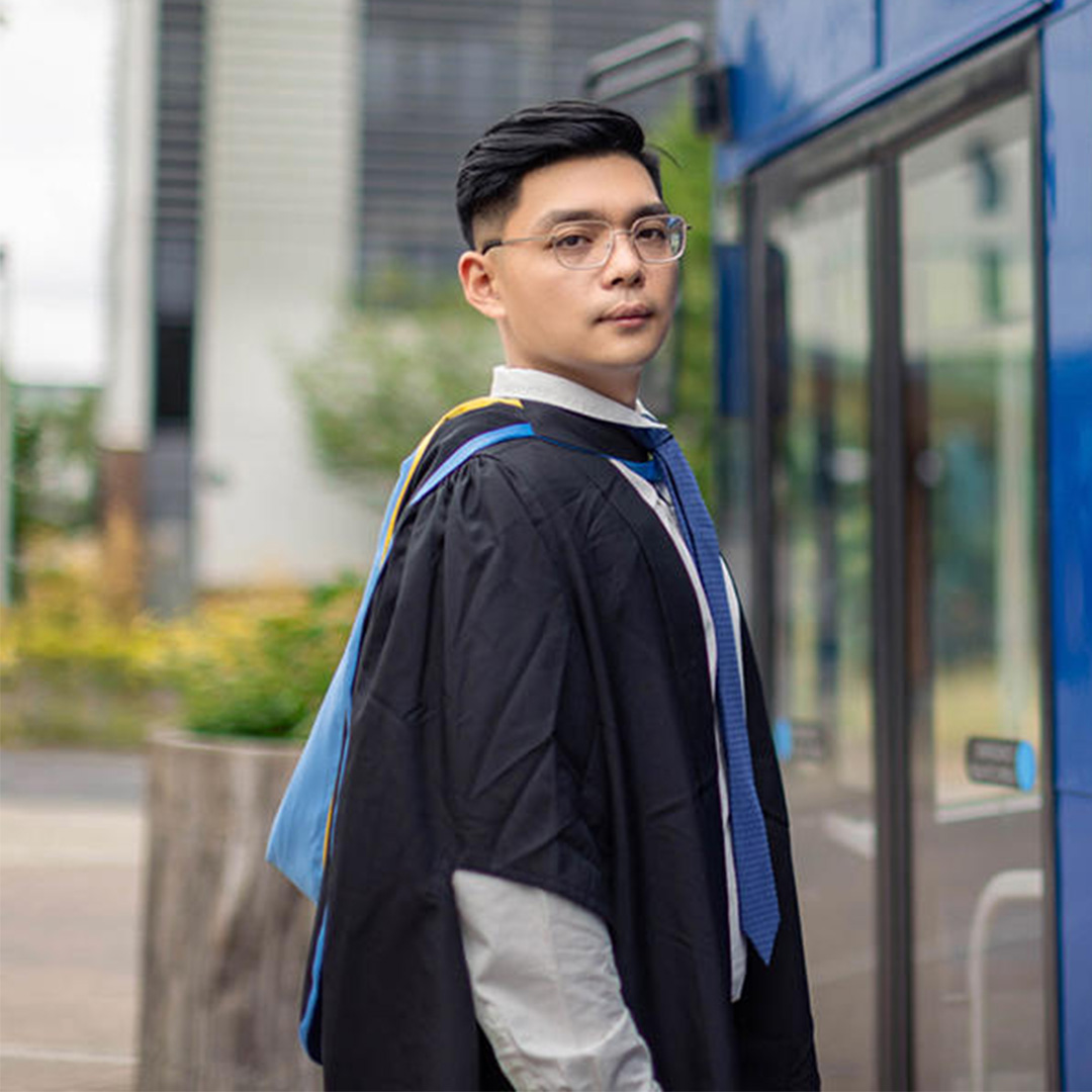 University of Worcester logo on a light blue background
