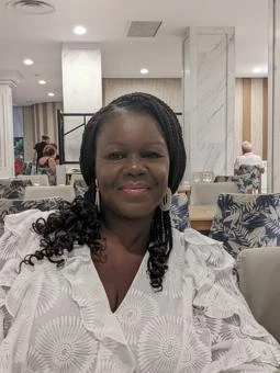 University of Worcester logo on a light blue background