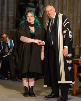 University of Worcester logo on a light blue background