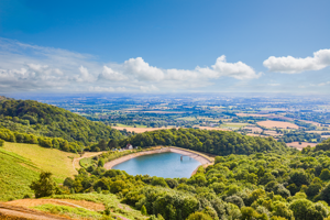 View of Malvern Reservoir and surrounding countryside on a sunny day
