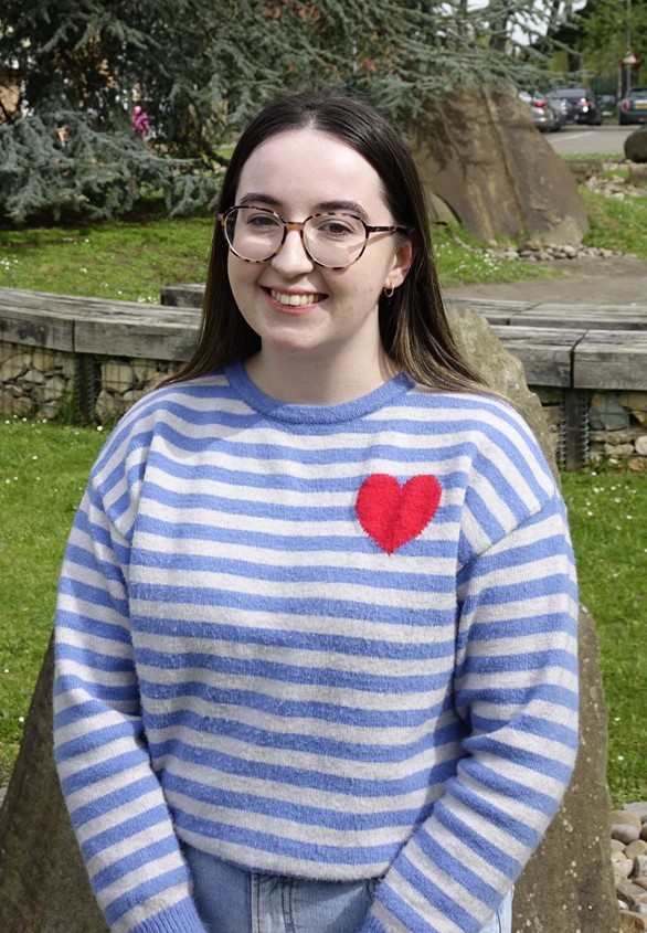 University of Worcester logo on a light blue background