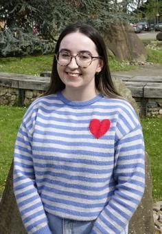 University of Worcester logo on a light blue background