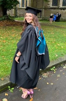 University of Worcester logo on a light blue background