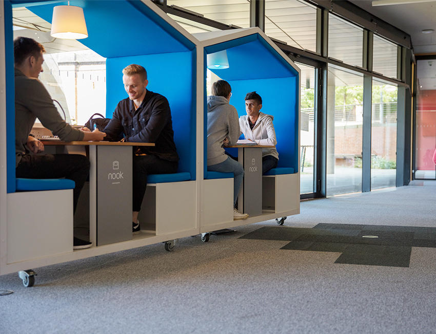 Students studying in The Hive library