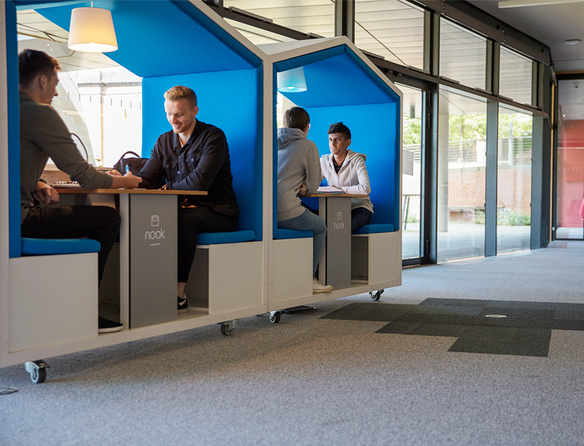 Students studying in The Hive library
