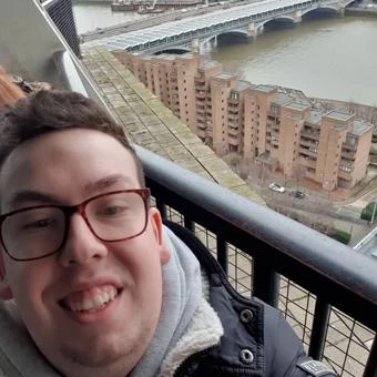 University of Worcester logo on a light blue background