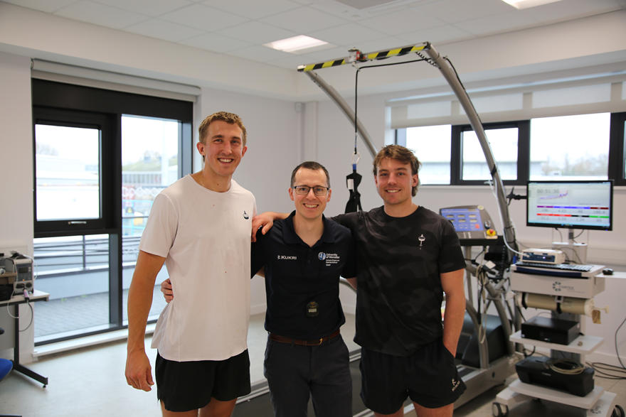 UW Alfie Matt and Joe pose together by a tredmill