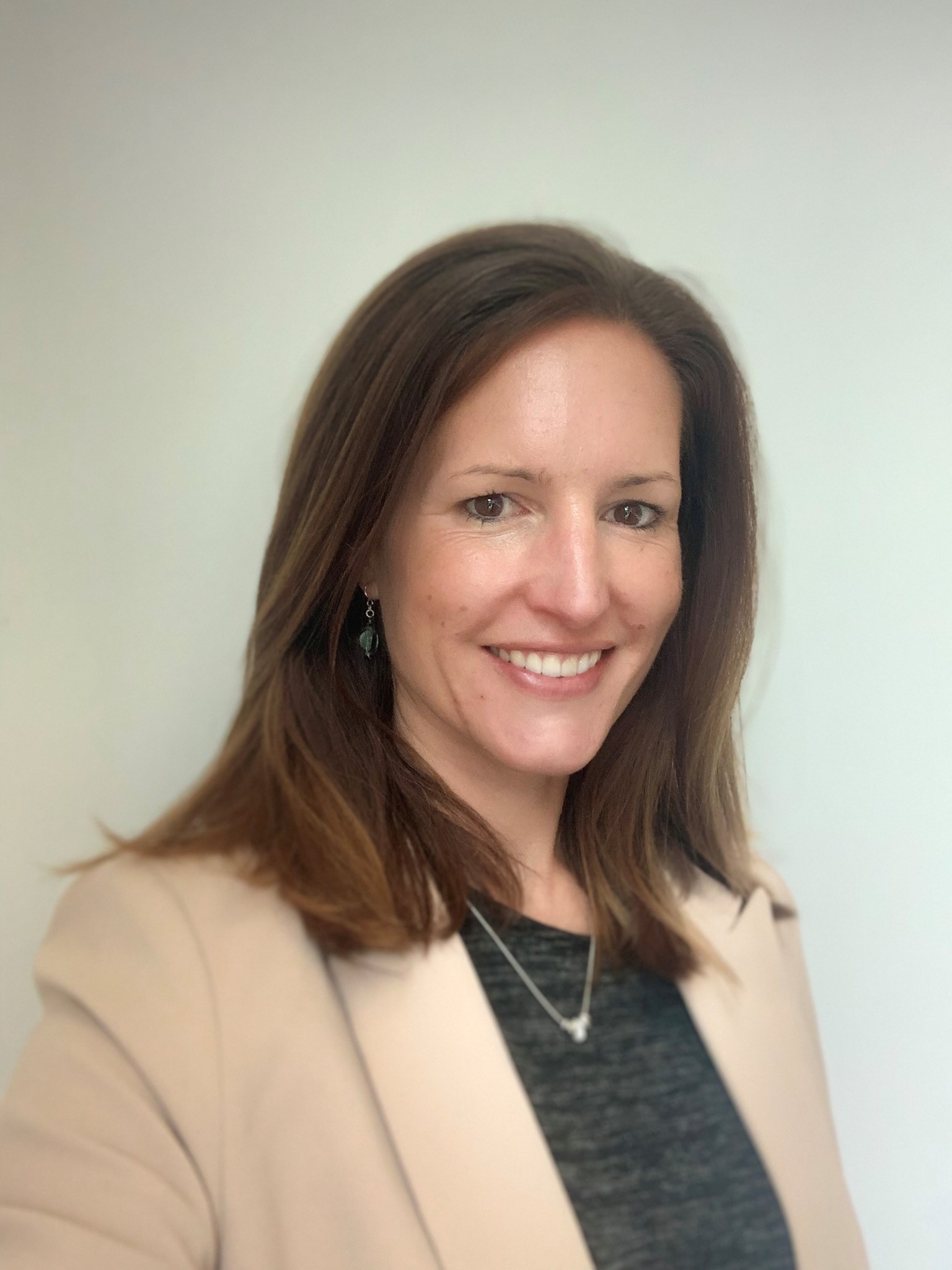 University of Worcester logo on a light blue background