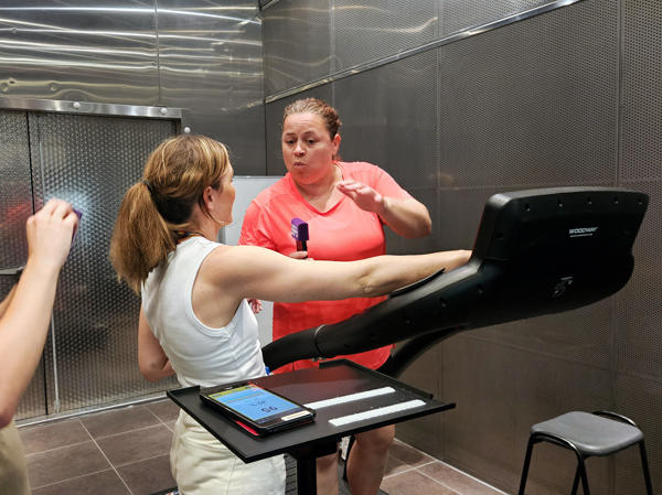 Jessica Mee is interviewed by Tammy Gooding who is standing on a treadmill in the environmental chamber