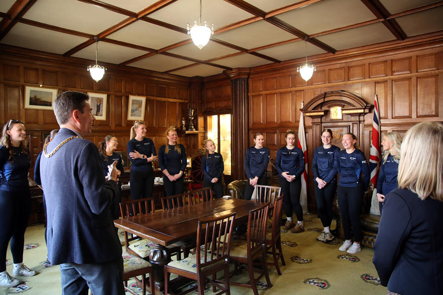 The mayor talks to the players