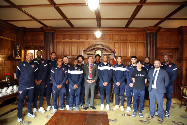 Worcester Wolves pose for a photo with the Mayor in the Mayor's Parlour