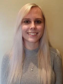 University of Worcester logo on a light blue background