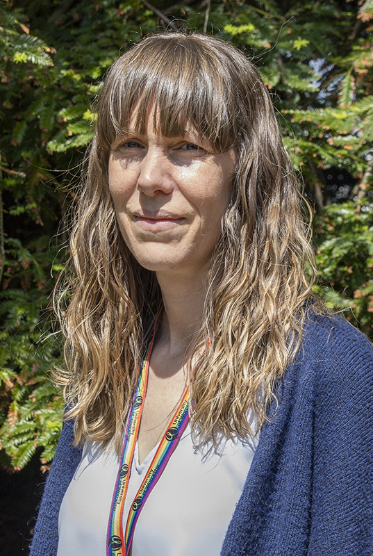 University of Worcester logo on a light blue background