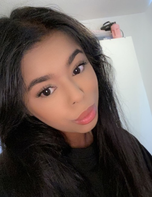 University of Worcester logo on a light blue background