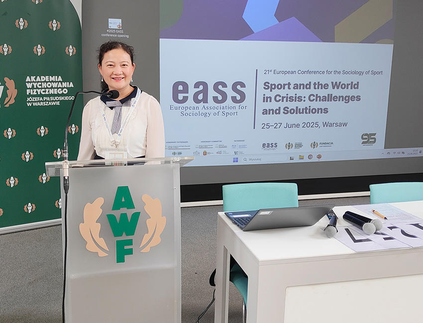 Chunhong Zhou speaking at conference