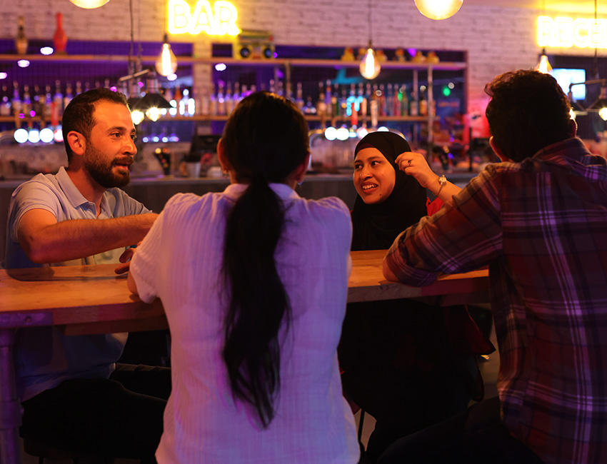 Group of students around a table at bowling