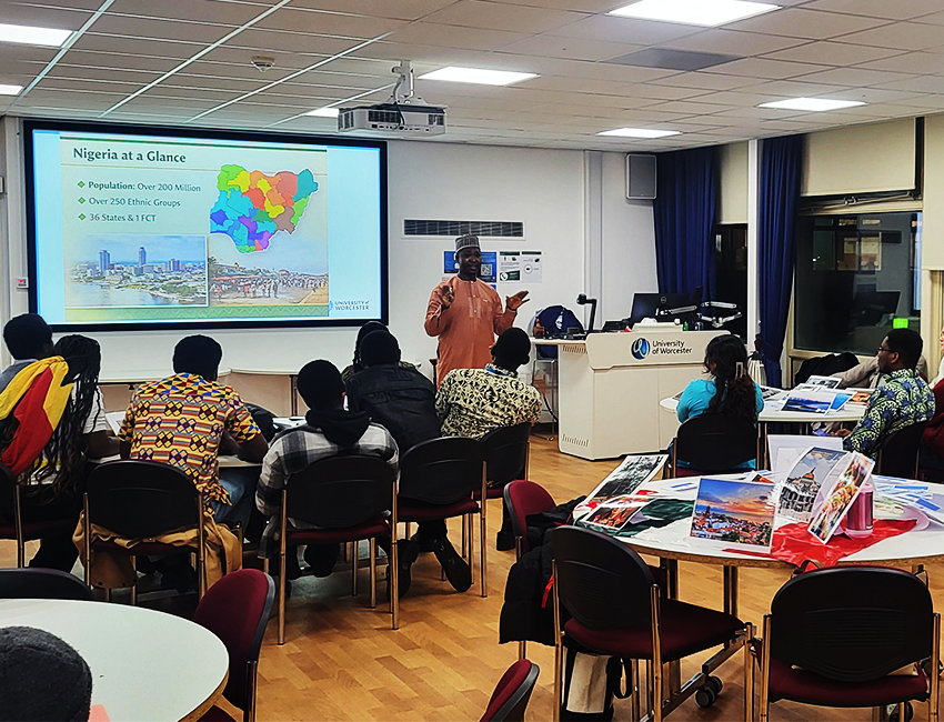 Student from Nigeria presenting his country to students