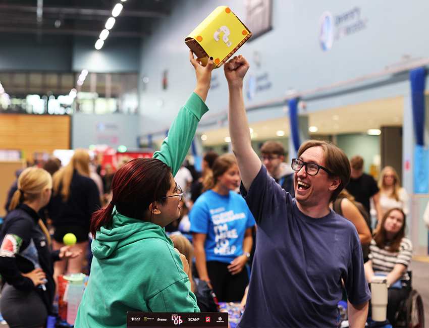 Students having fun at societies fair