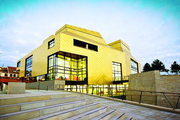 The outside of the Hive library in the sunshine