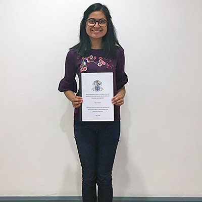 University of Worcester logo on a light blue background