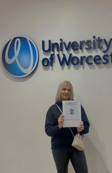 University of Worcester logo on a light blue background