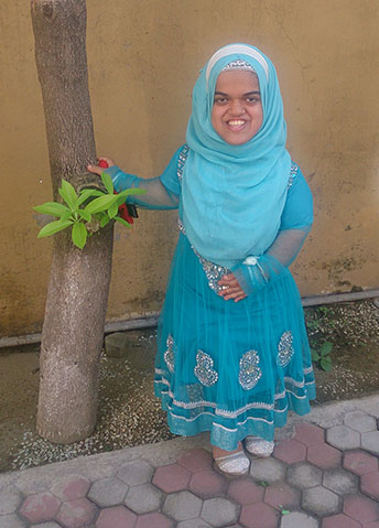 University of Worcester logo on a light blue background