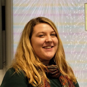 University of Worcester logo on a light blue background