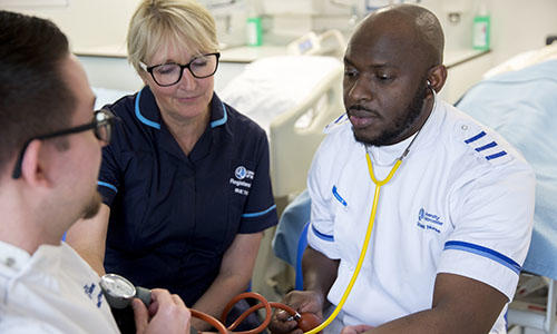 Students on university Nursing degree using stethoscope