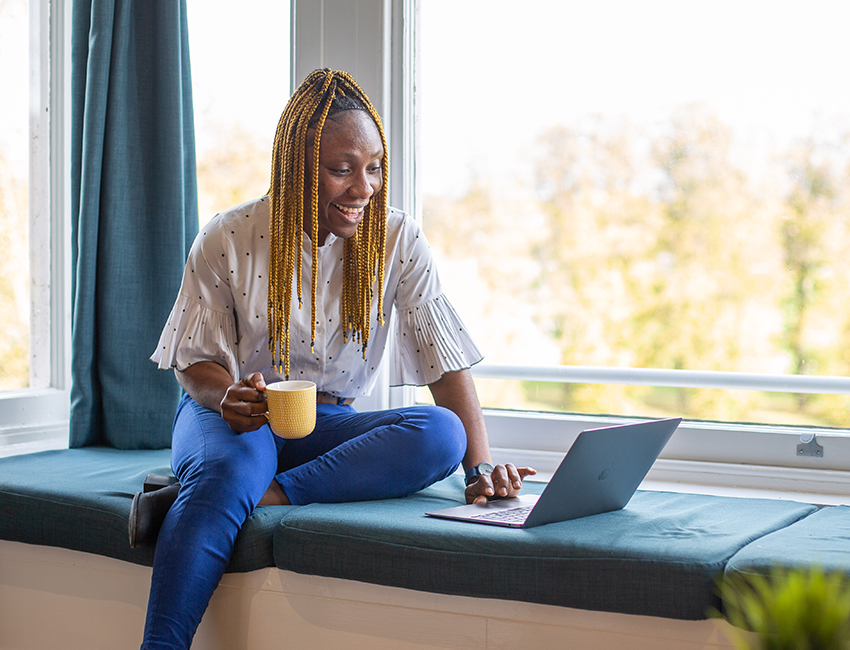 A woman working on a laptop