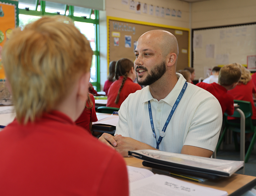 a teacher talking to a student