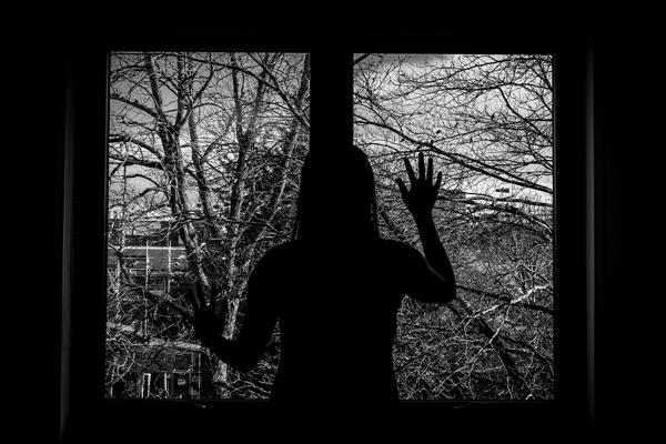 silhouette of a girl at the window