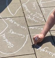 Chalk drawings on the pavement