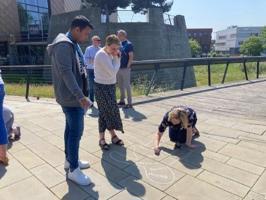 Chalk drawing on the pavement during a networking event