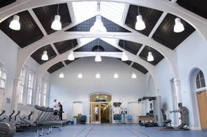 inside a large room with a tall ceiling
