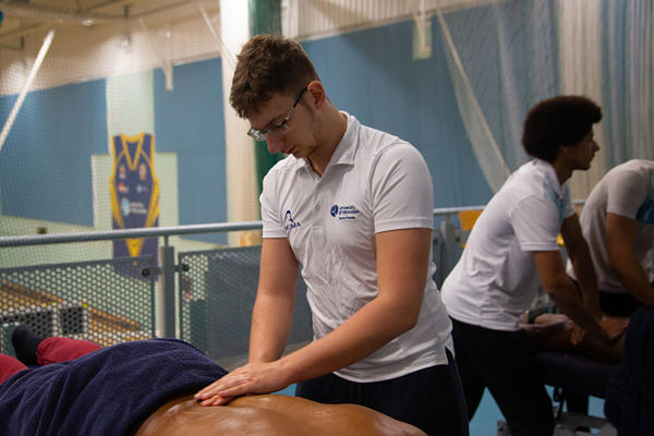 Sports Therapy degree student massaging
