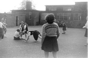 A mixed netball game in the 1950s
