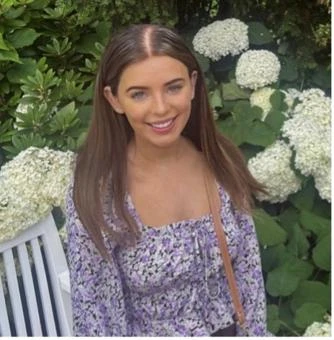 University of Worcester logo on a light blue background