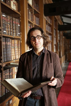 University of Worcester logo on a light blue background