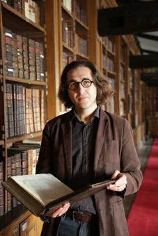 University of Worcester logo on a light blue background