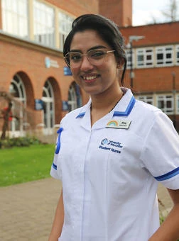 University of Worcester logo on a light blue background