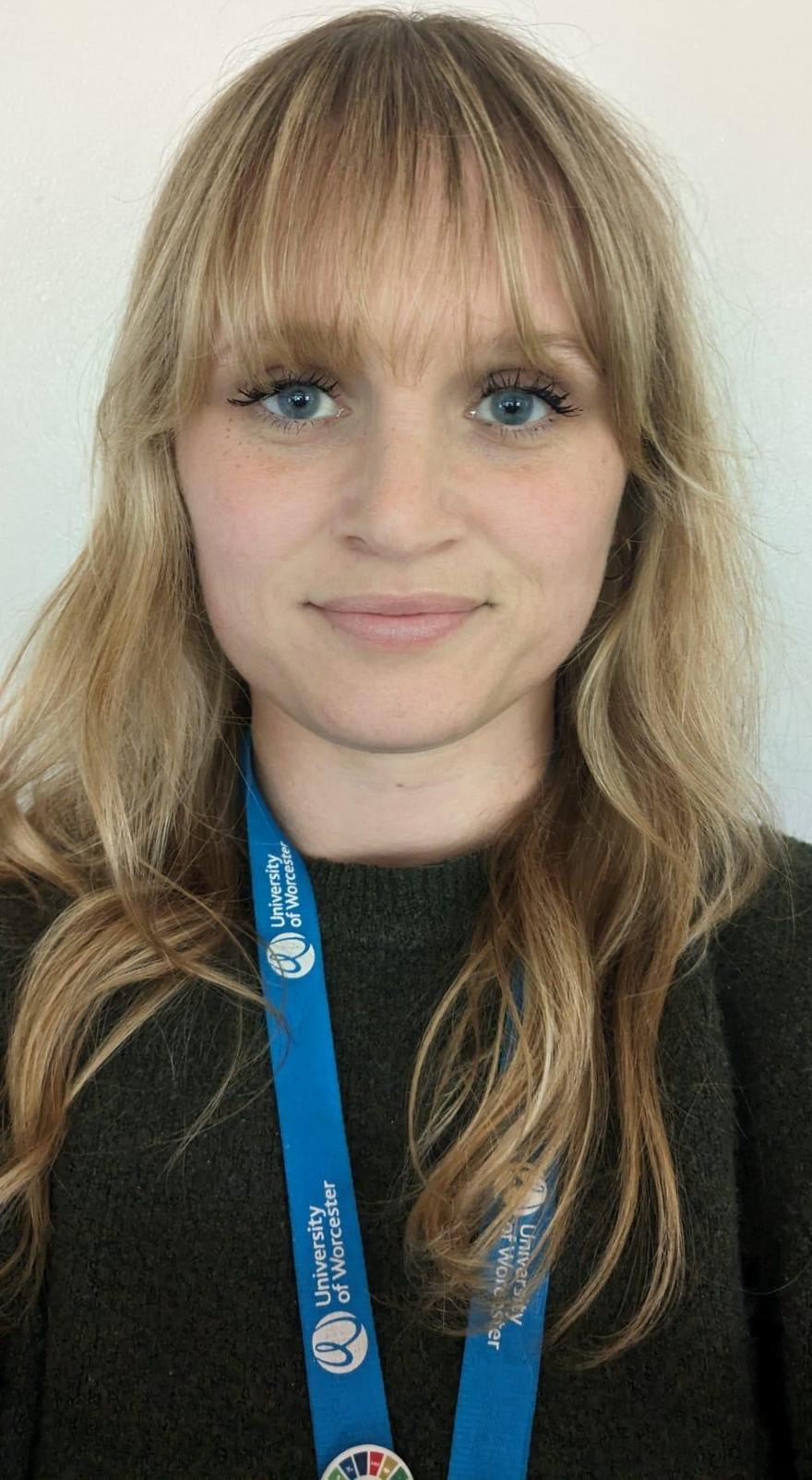 Head and shoulders photo of person facing camera