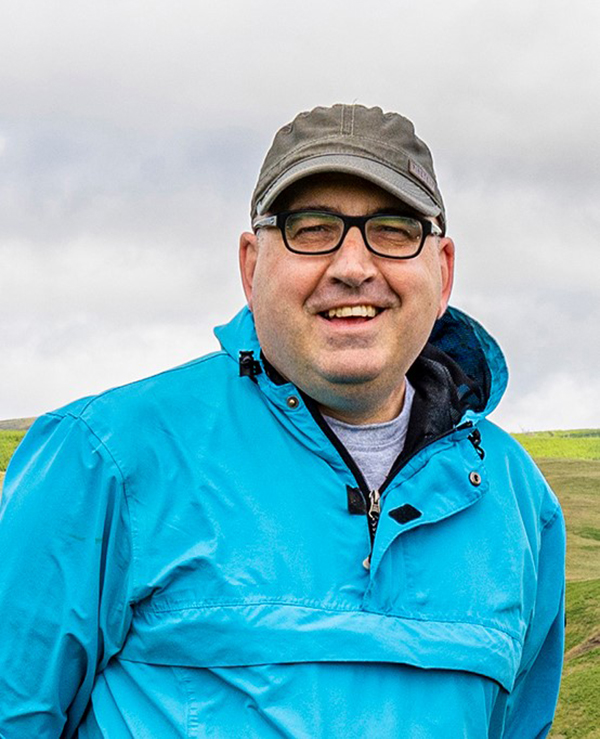University of Worcester logo on a light blue background