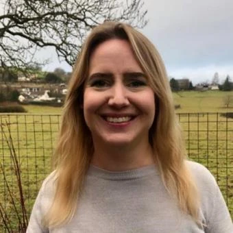 University of Worcester logo on a light blue background