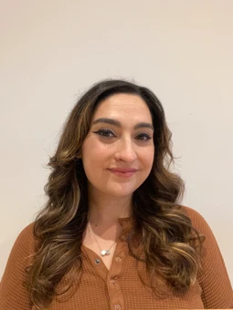 University of Worcester logo on a light blue background